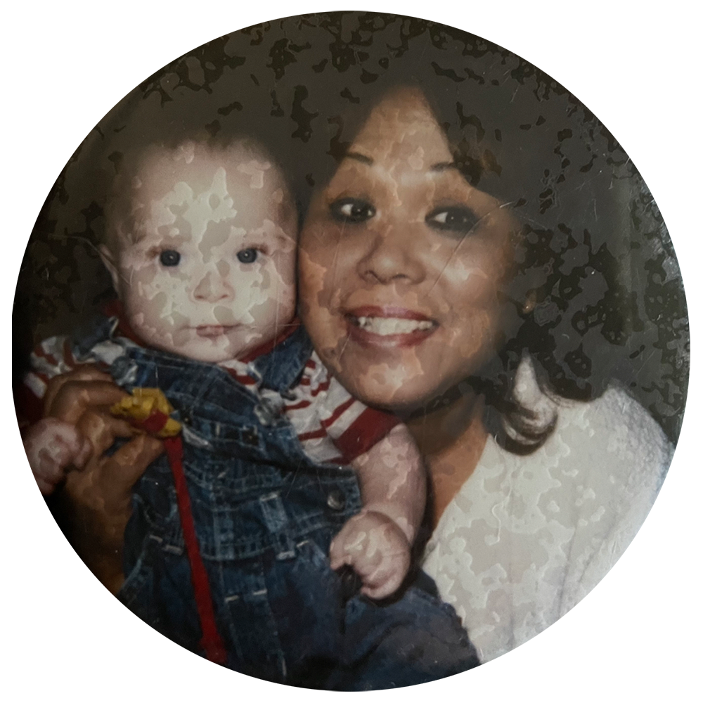 Baby photo of me being held by my grandma Nobuko Yonaha.